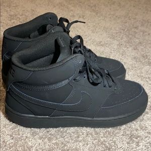NIKE matte black suede high top sneakers